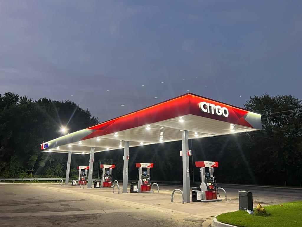 A citgo gas station is lit up at night