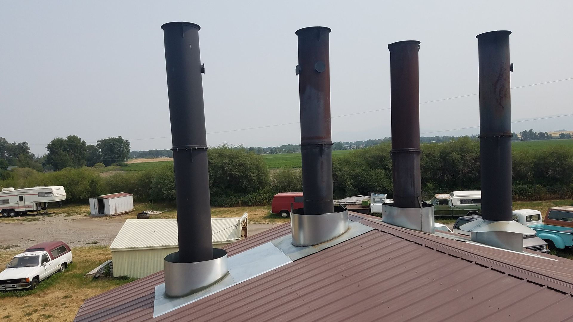 A row of chimneys on the roof of a building