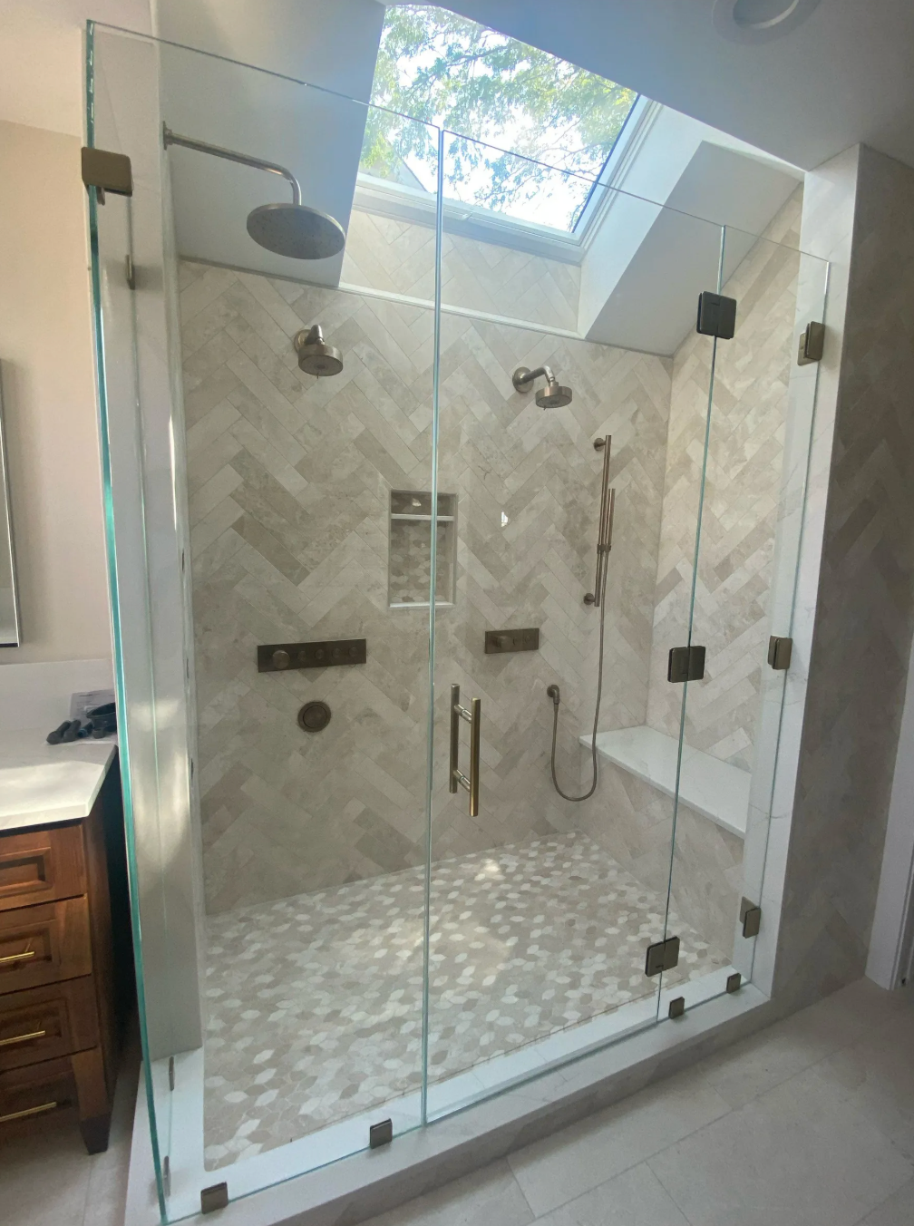 Frameless shower enclosure in Greater Boston home