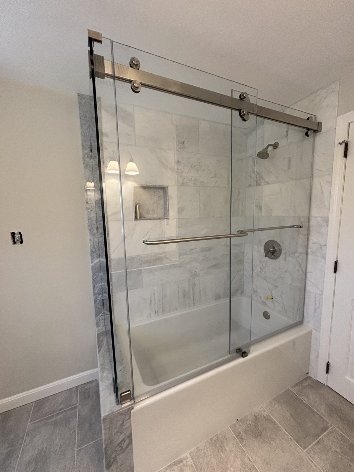 Sliding glass bathtub doors with brushed nickel hardware, Barnstable, MA