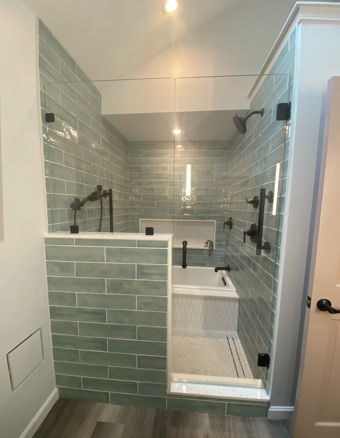 Glass tub enclosure replacing a shower curtain in Greater Boston