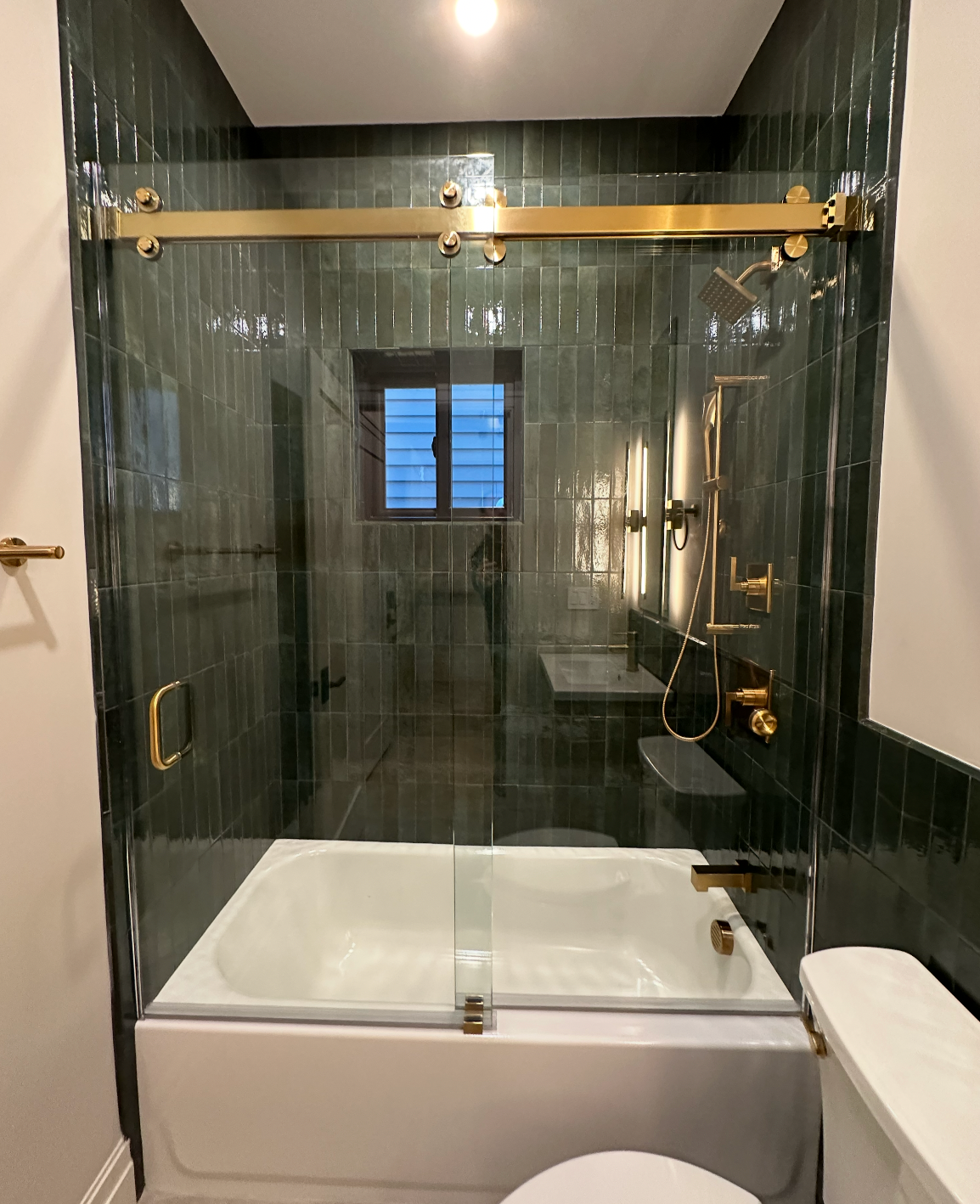 Frameless glass shower in Cape Cod condo