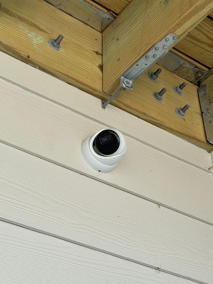 3Cs Audio Visual LLC | security camera is mounted to the ceiling of a building.