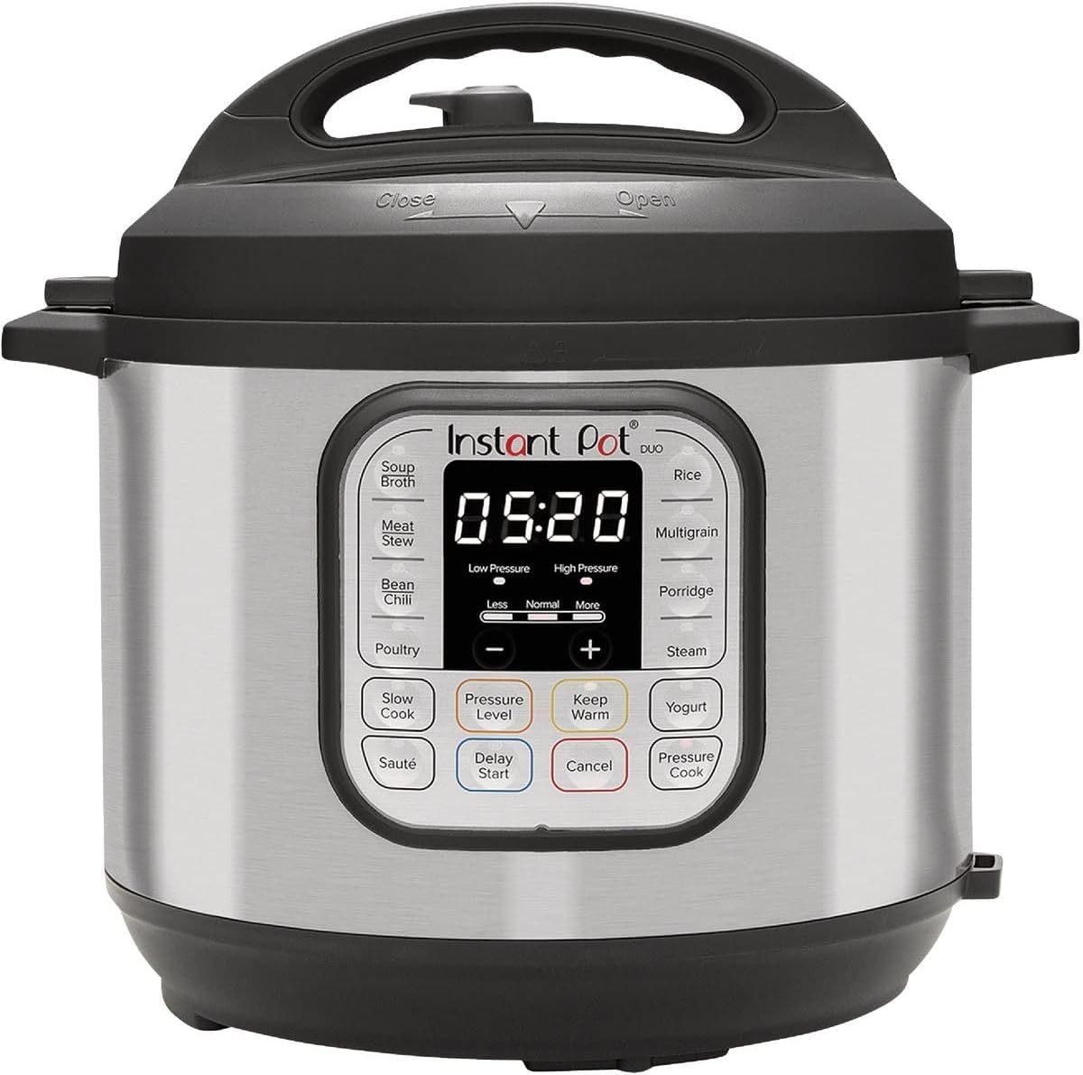 Stainless steel Instant Pot with digital display showing 5:20.