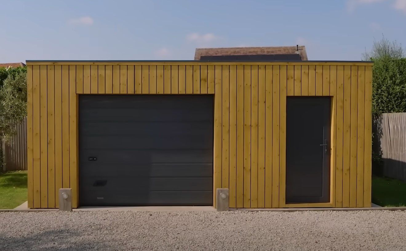 Detached accessory dwelling unit with garage door