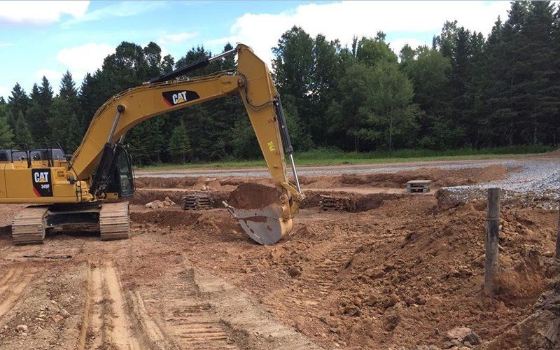 Excavator in Action — Ogema, WI — Jeff Simek Construction Co Inc