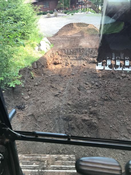Excavator digging dirt. Excavator digging dirt.