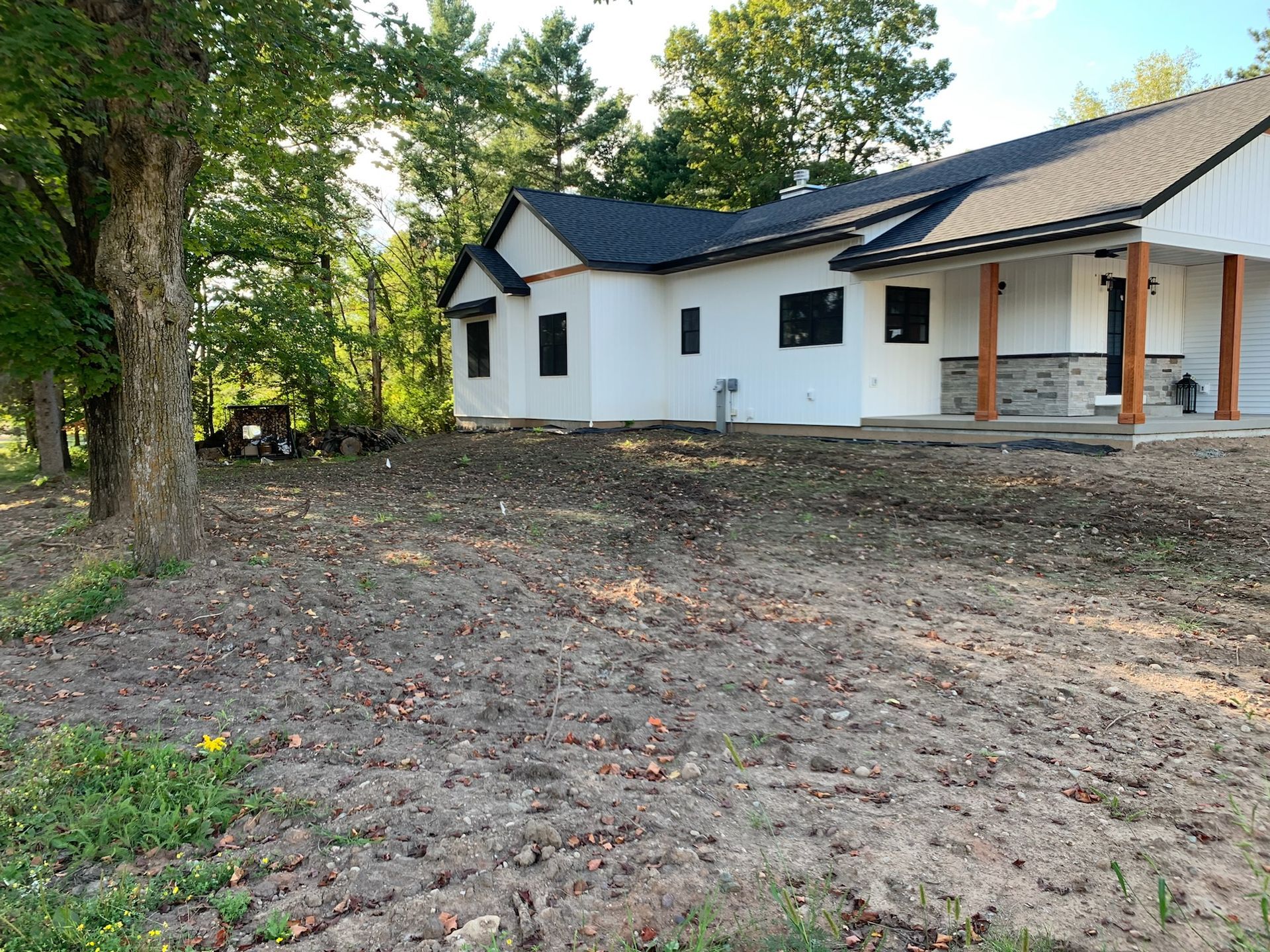 White farmhouse under construction