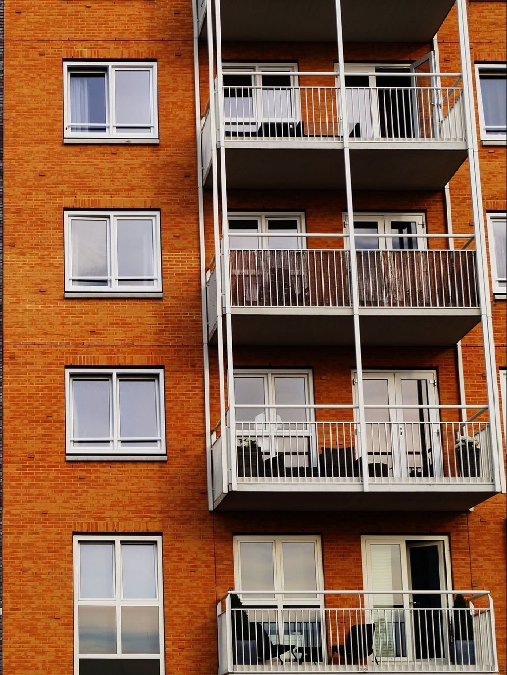 pest control services in Lancaster, PA a brick building with many balconies and windows