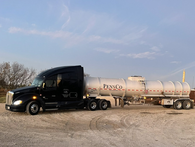 Black tractor trailer oil transport