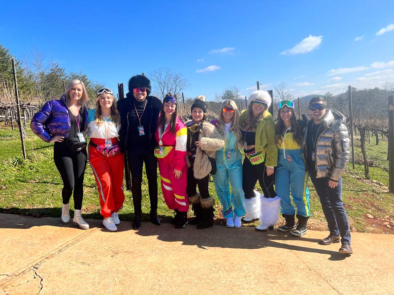 people in costumes in a vineyard