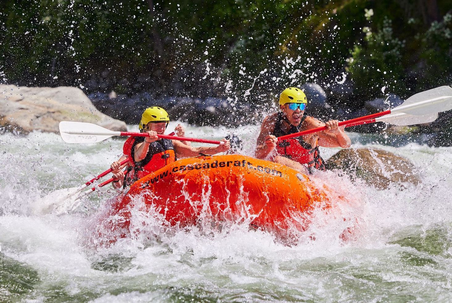 Rafters paddling through Class III-IV whitewater on the South Fork of the Payette River near Boise, Idaho