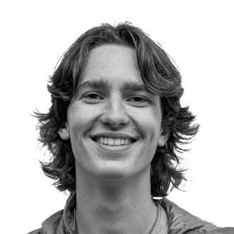 Black-and-white portrait of a smiling staff member