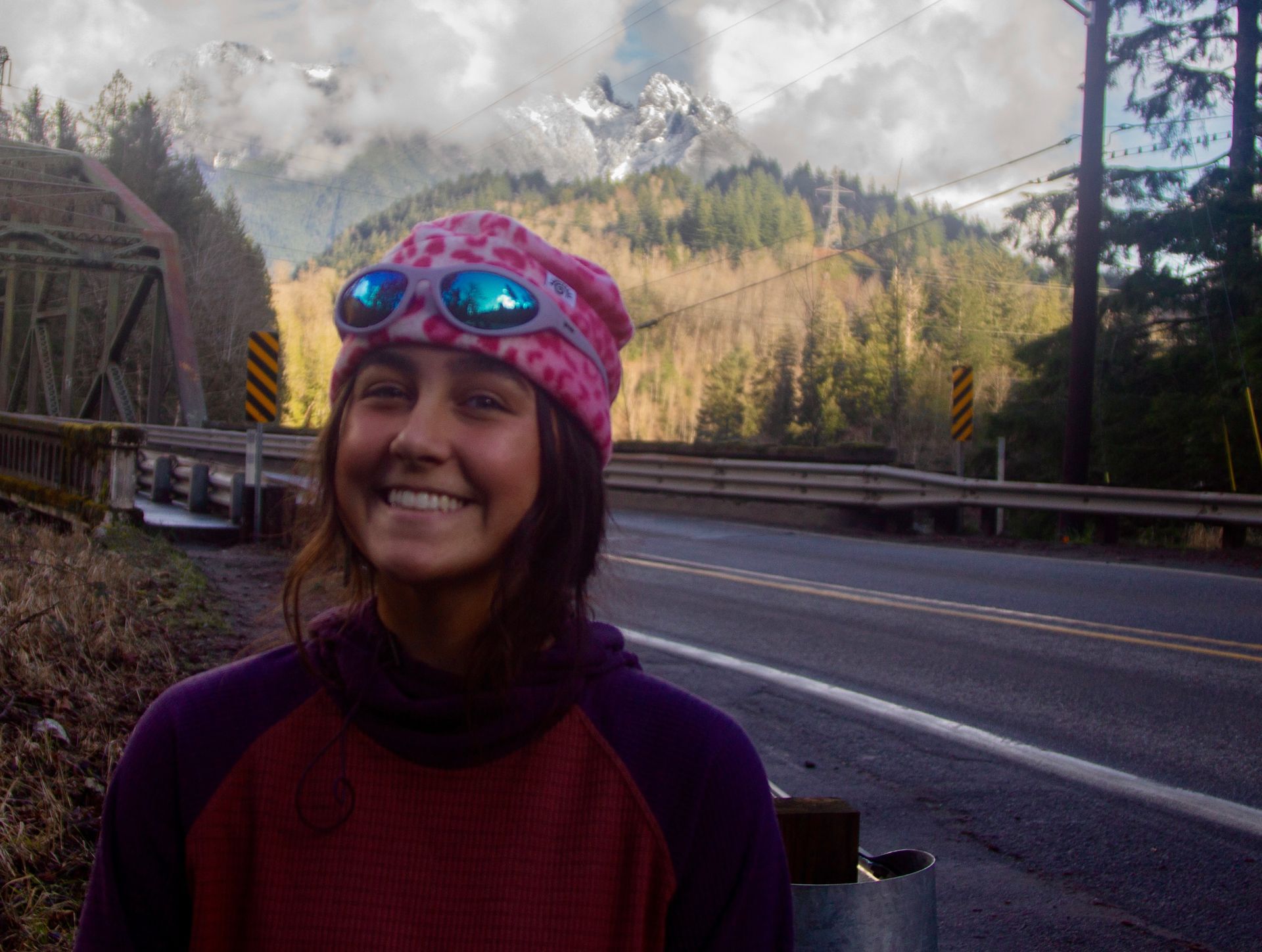 Staff member wearing a helmet outdoors