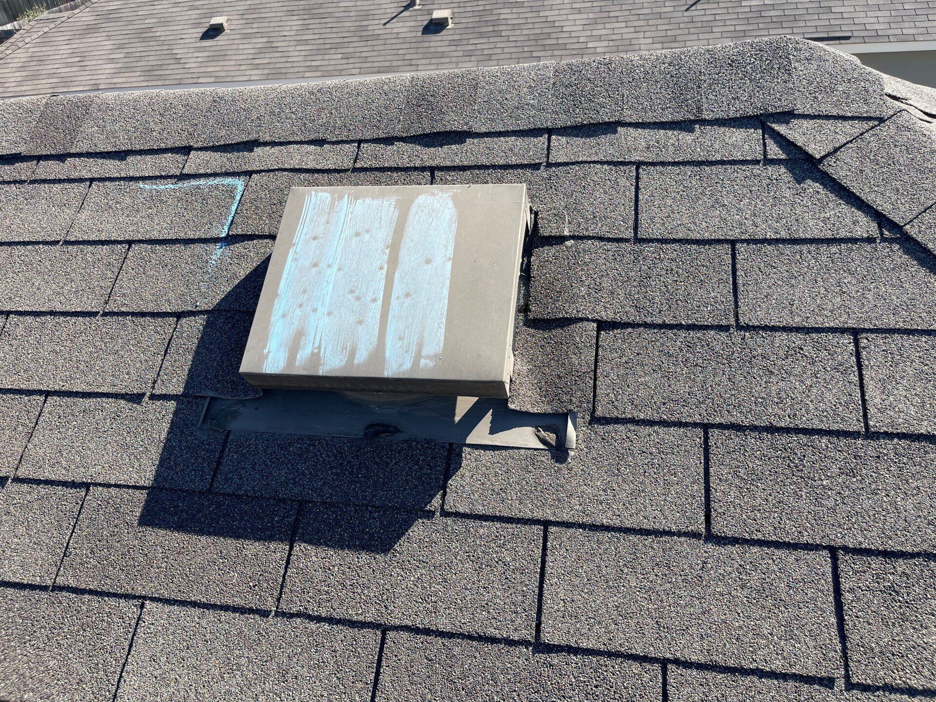 A roof with a square on it that says aa on it.