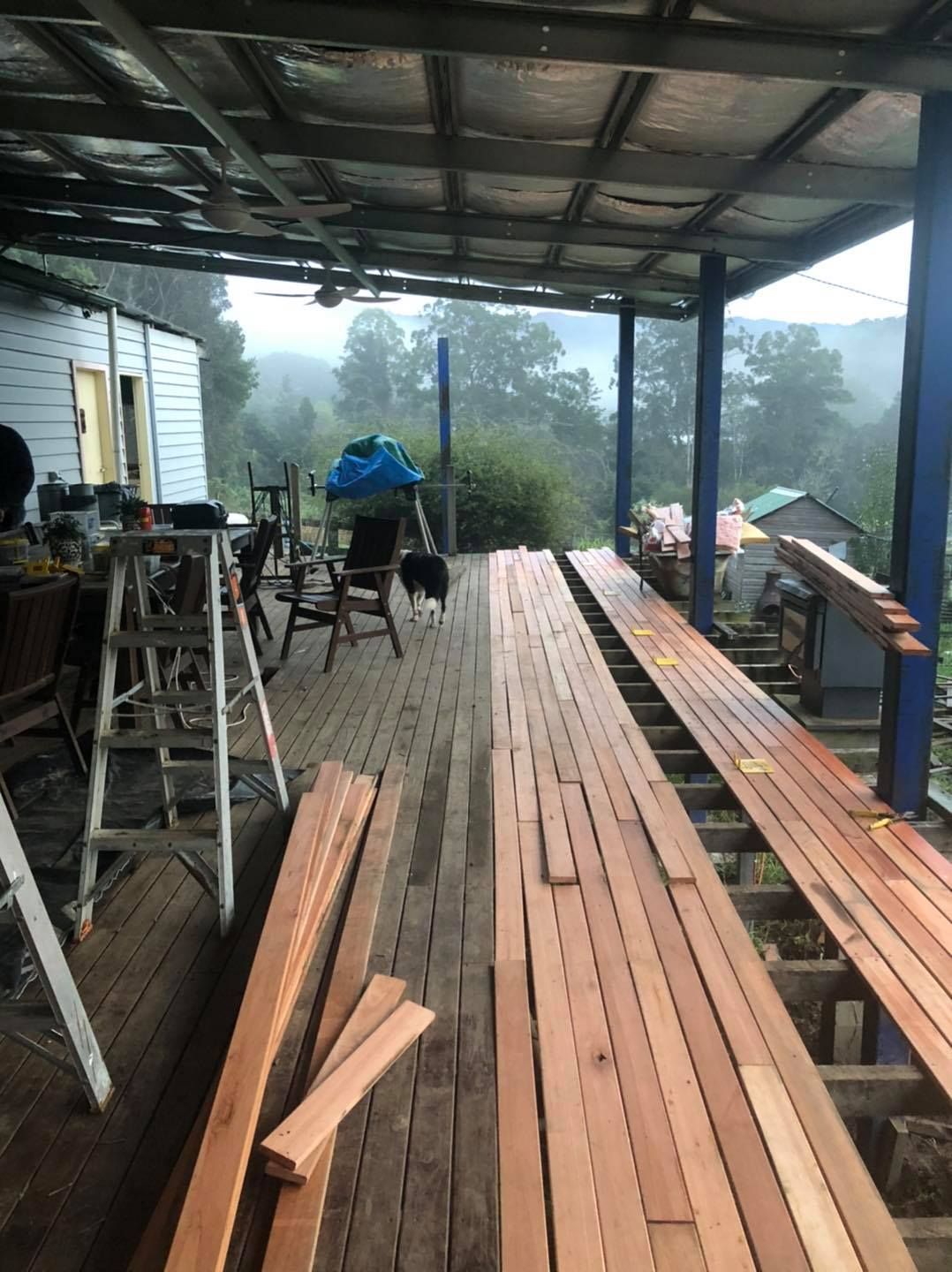 A Covered Deck Under Construction With New Wooden Boards Laid Out — Alcando Renovations and Maintenance In Taree, NSW