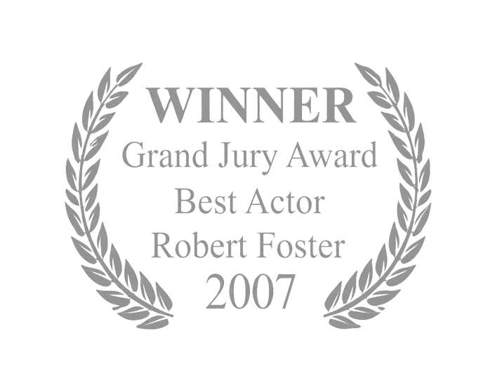 Silver laurel award emblem reading “WINNER Grand Jury Award Best Actor Robert Foster 2007”