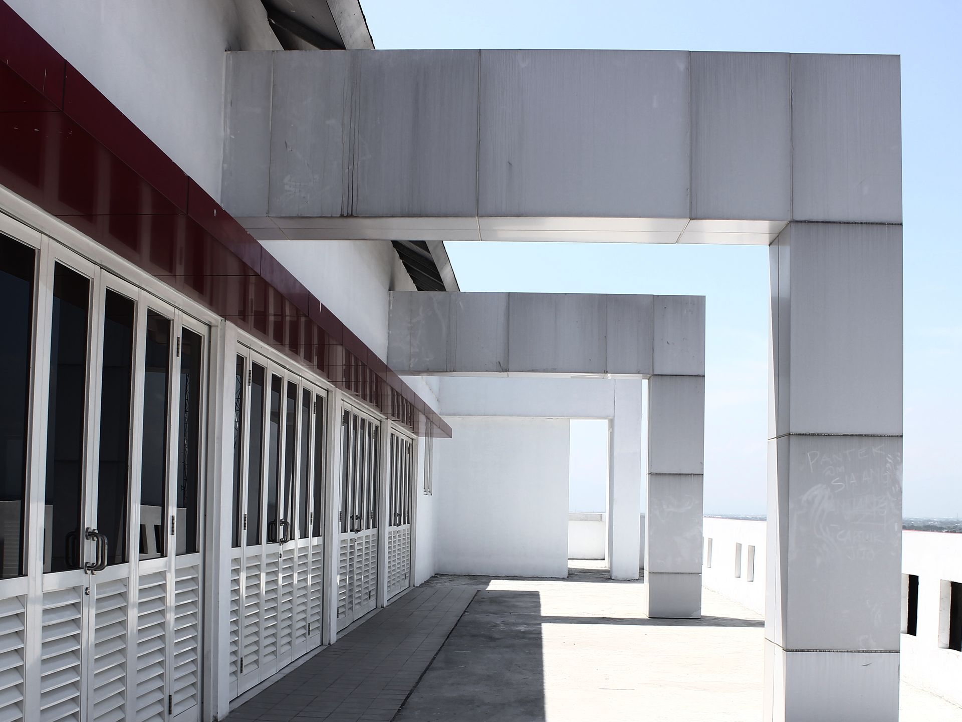 A building with a lot of windows and shutters