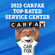 Car Fox mascot holding a 