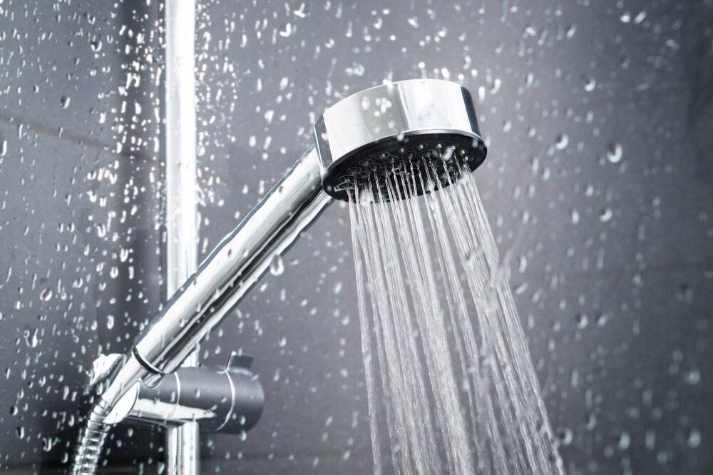 A Close Up of a Shower Head With Water Coming Out of It — Rock Plumbing & Gasfitting In Proserpine, QLD