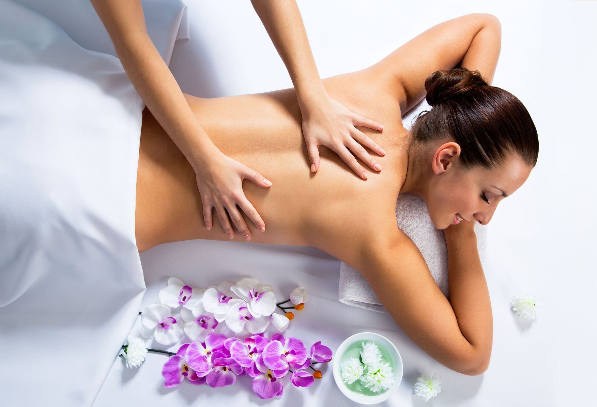 A woman is getting a massage at a spa.