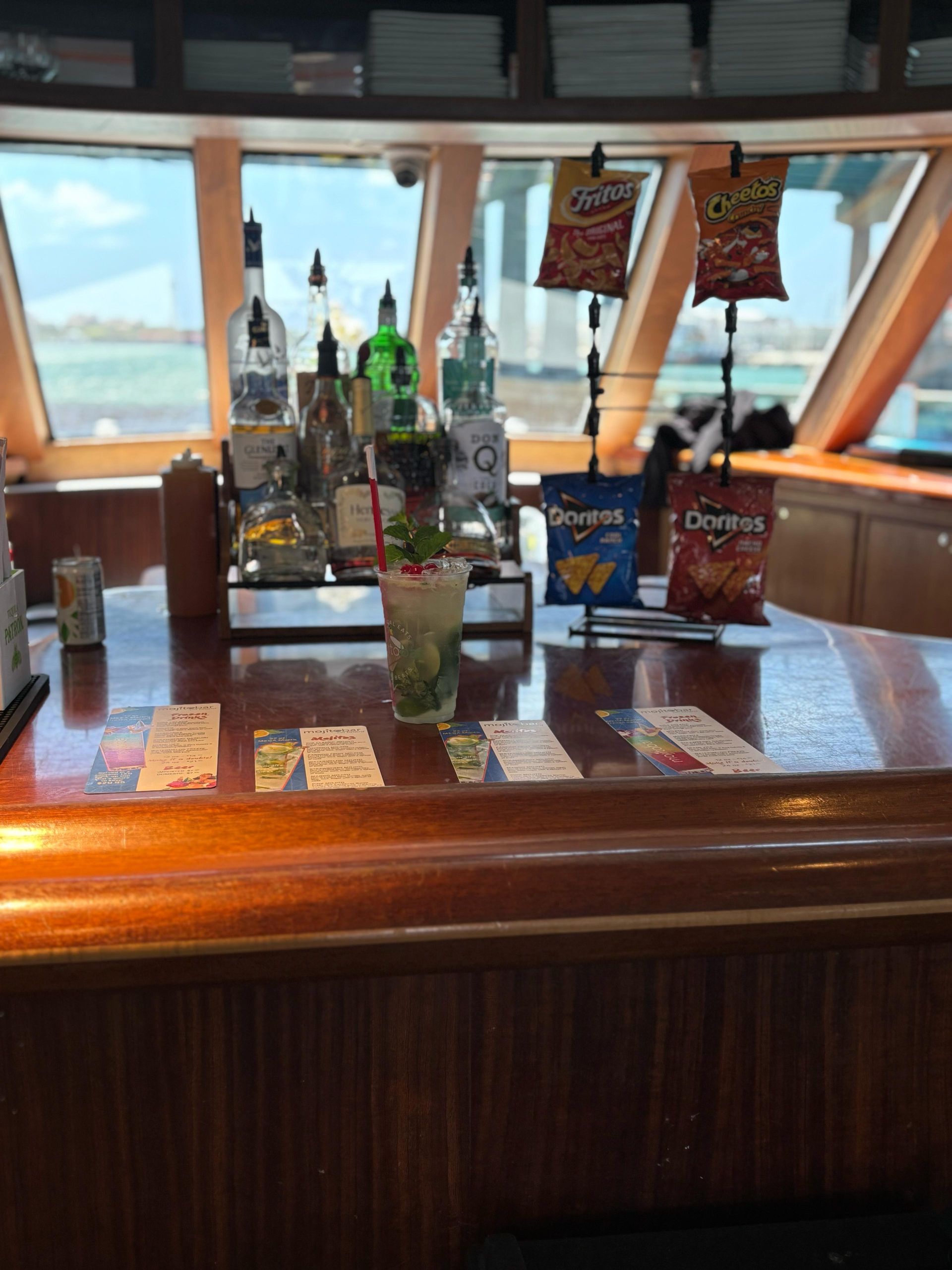 Mojito Bar setup with drink menu and snacks during the Miami Mansion Boat Tour experience
