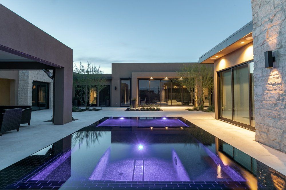 A large swimming pool in the middle of a house