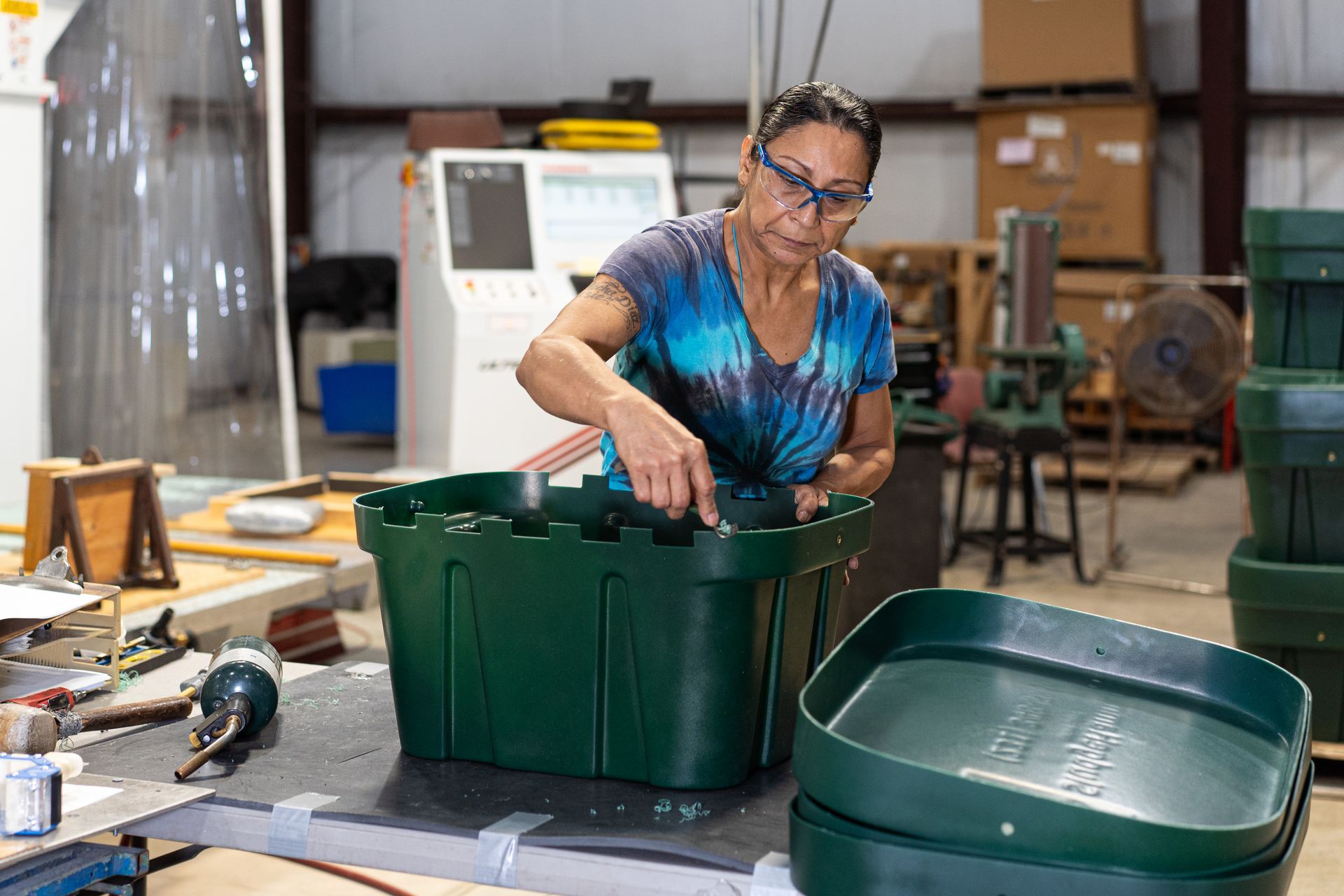 Roto Plastics Employee Working on Storage Container in Adrian, MI