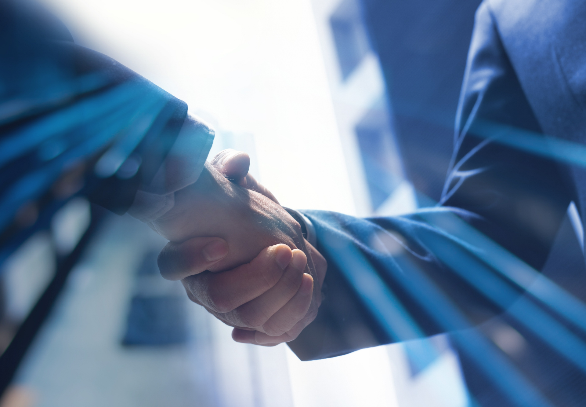 Image of a people shaking hands