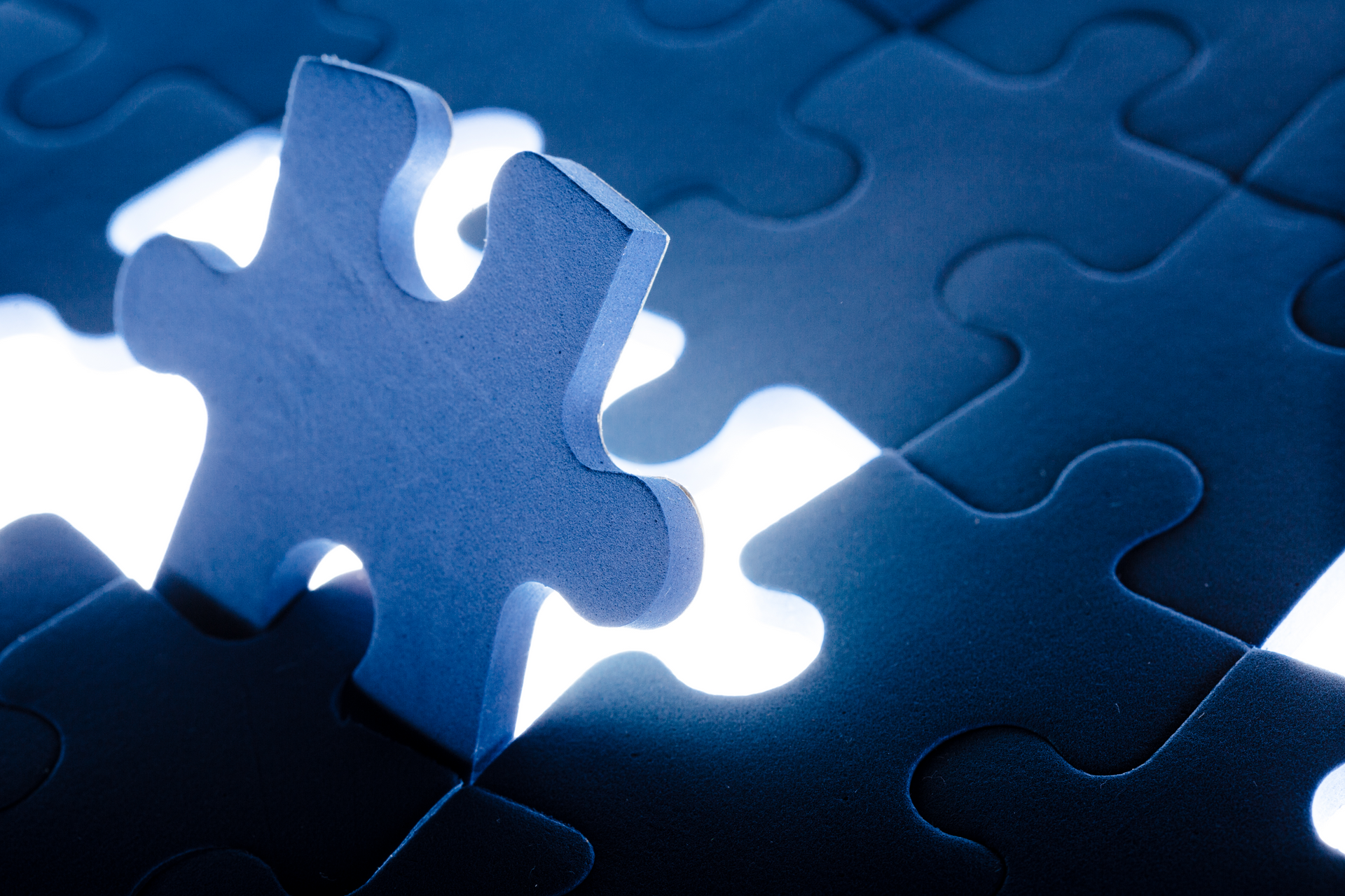 Group of blue puzzle pieces