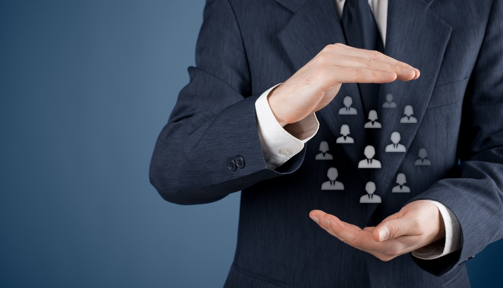 Image of a person holding contact icons