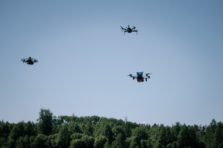 image of three drones