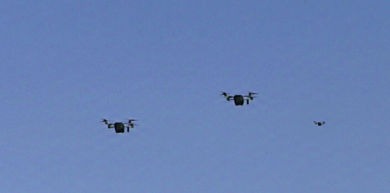 3 drones flying