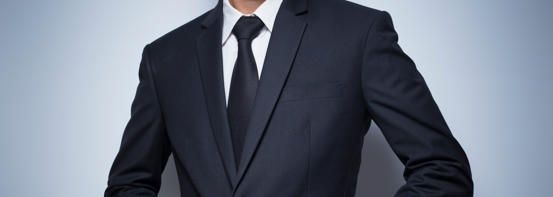Picture of a black suit. Picture of a black suit.
