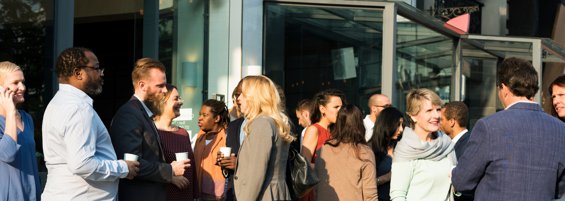 Picture of a gathering of smartly dressed people. Picture of a gathering of smartly dressed people.