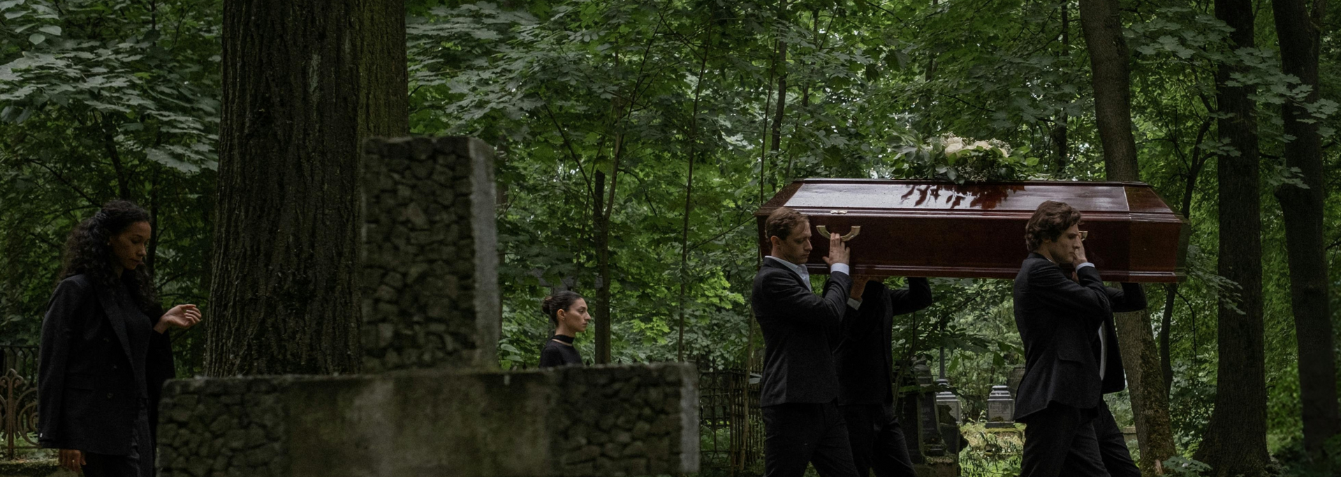 Picture of pallbearers carrying a coffin. Picture of pallbearers carrying a coffin.