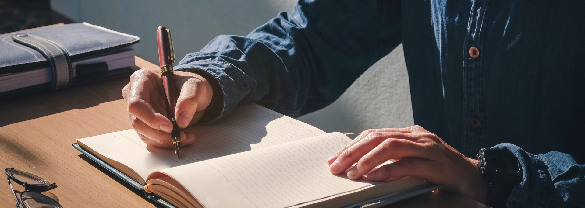 Picture of someone writing. Picture of someone writing.