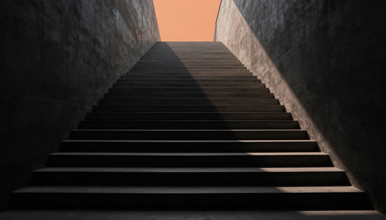 Light breaking through a dark ascending stairwell