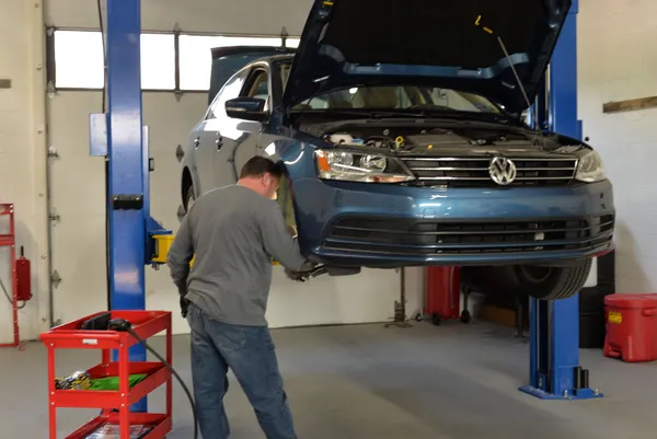 Mechanic-working-in-garage-area | Three Suns Auto Care