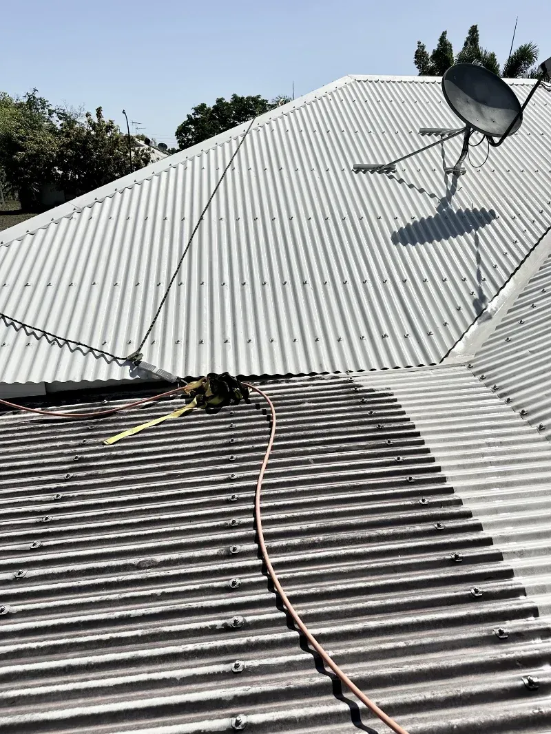 Corrugated Metal Roof With a Satellite Dish — I Do It All in Noosa, QLD