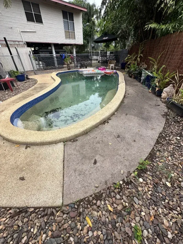 A Backyard Swimming Pool with Curved Stone Edge — I Do It All in Caloundra, QLD