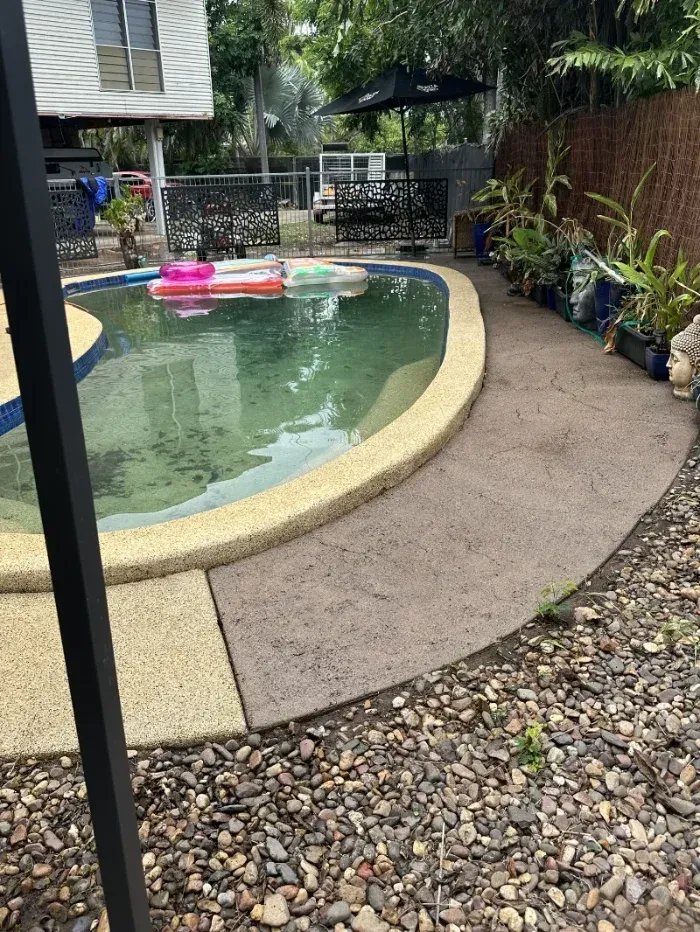 A Backyard Pool with Curved Stone Edge — I Do It All in Caloundra, QLD