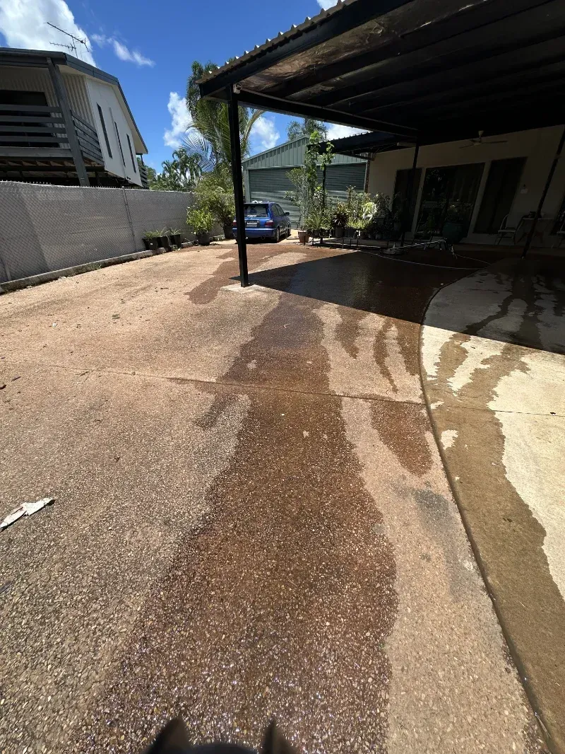 Wet, Gravel Driveway Leads Toward a Carport — I Do It All in Caloundra, QLD
