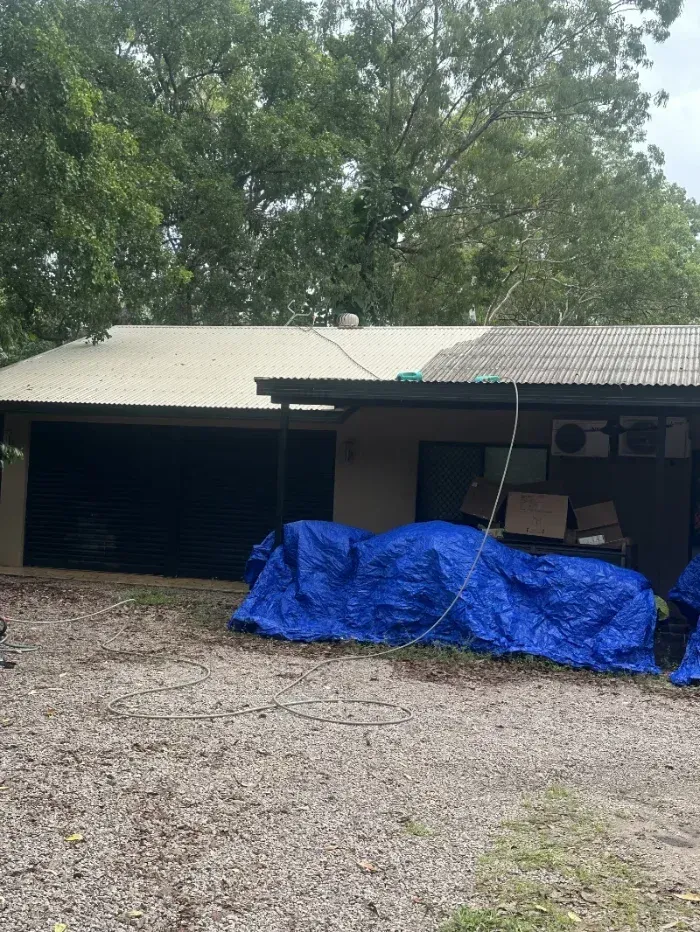 A House with A Large Blue Tarp Covering an Outdoor Area — I Do It All in Caloundra, QLD