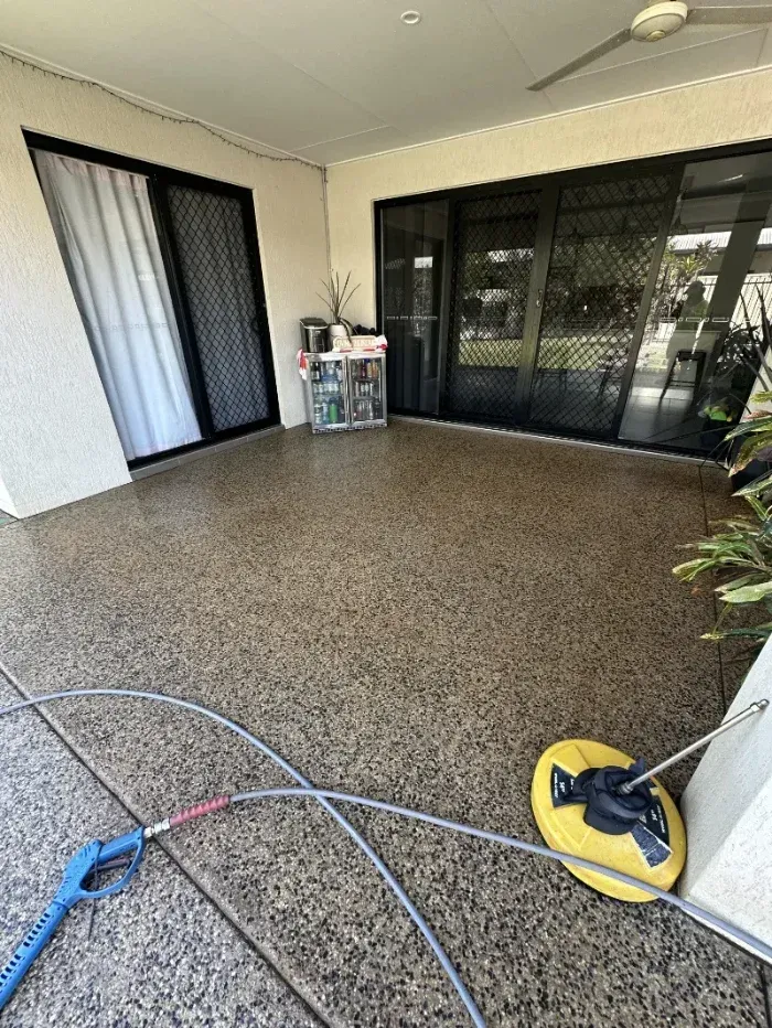 Patio With Speckled Flooring, Sliding Glass Doors — I Do It All in Coolum, QLD