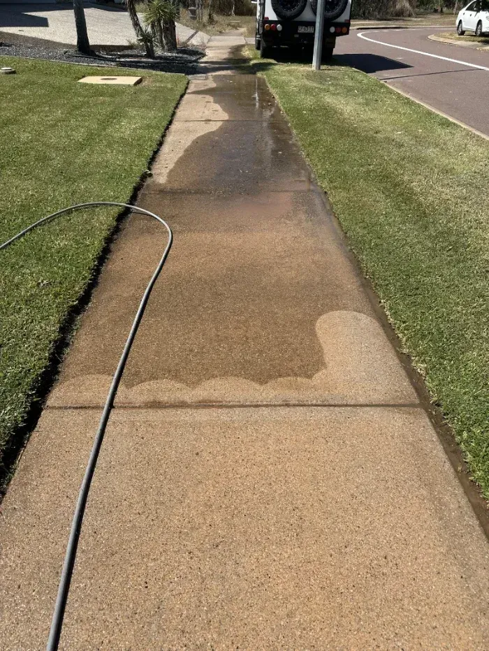 Residential Concrete Sidewalk Being Cleaned With a Hose — I Do It All in Maleny, QLD