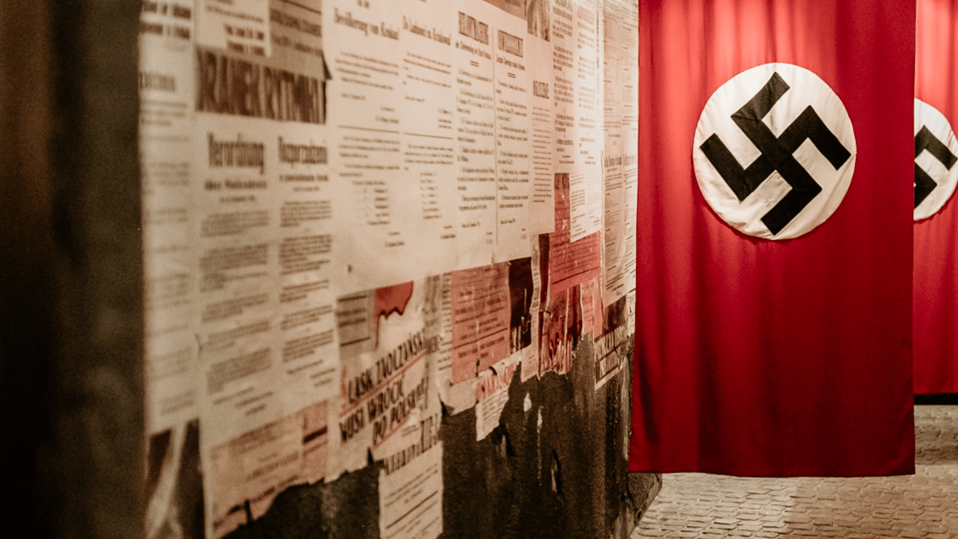 World War II museum exhibit with Nazi flag