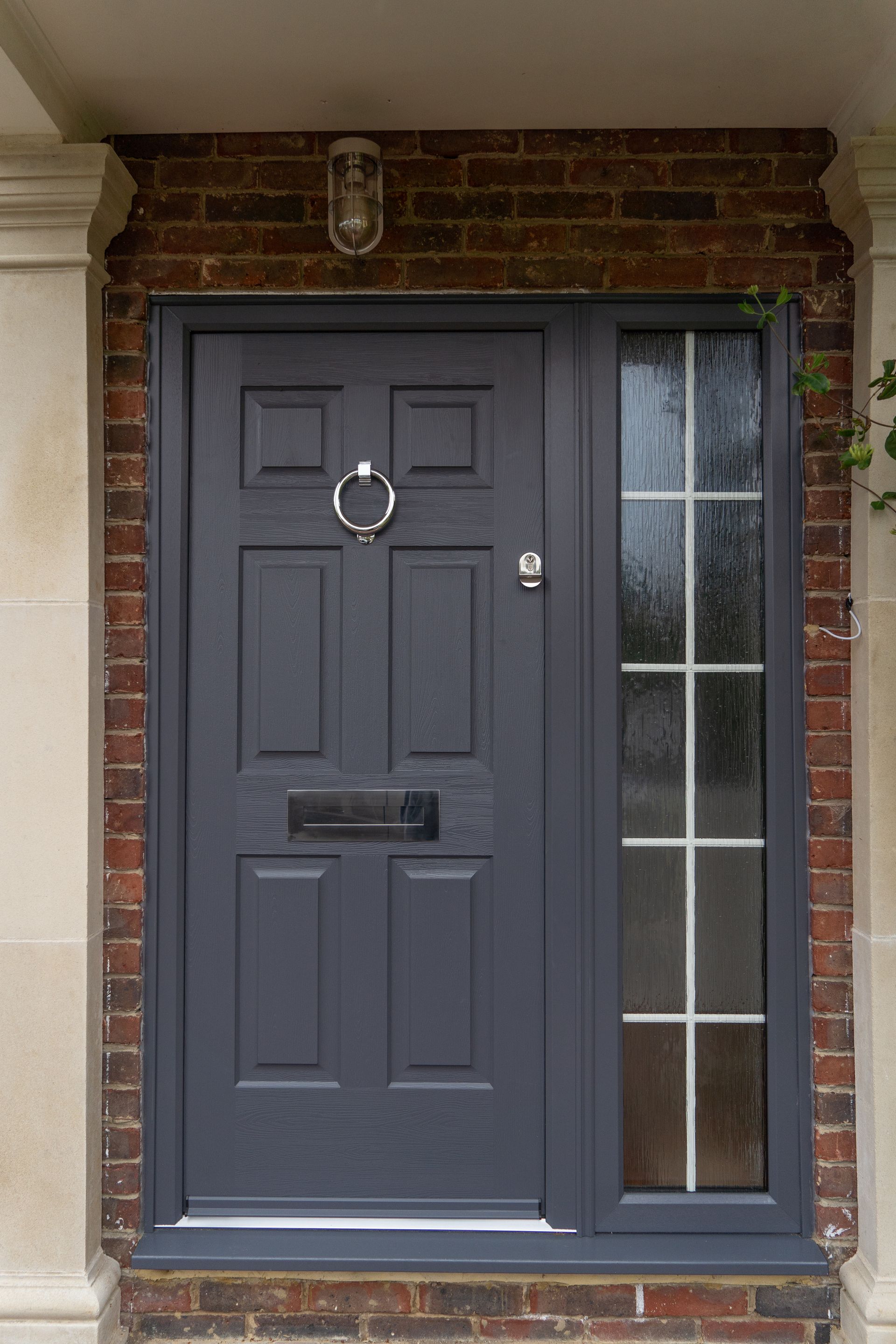 grey composite front door installed in sussex