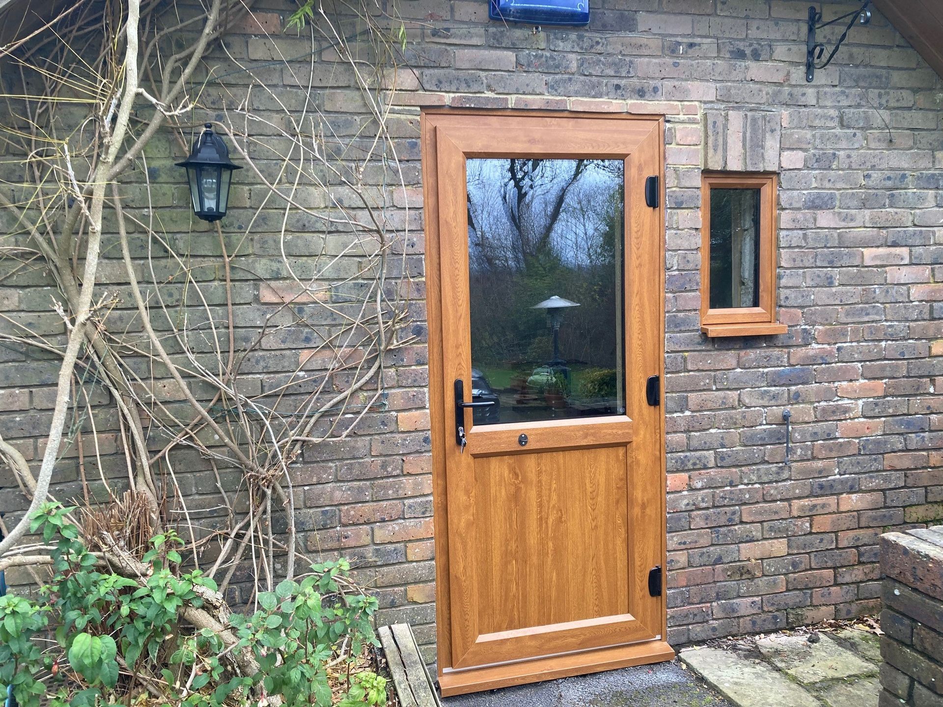 PVCu timber look back door in sussex