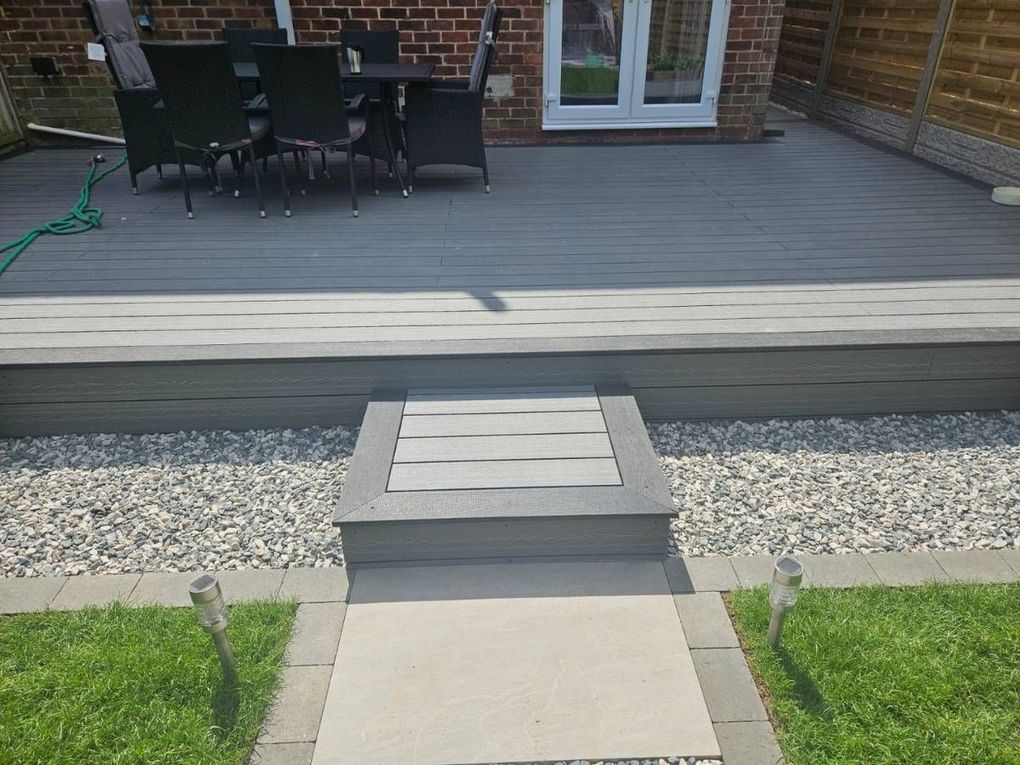 Anthracite composite decking with a charcoal bullnose border and step in Wyken, Coventry